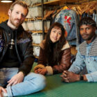 Three LS&Co. employees smiling at the camera