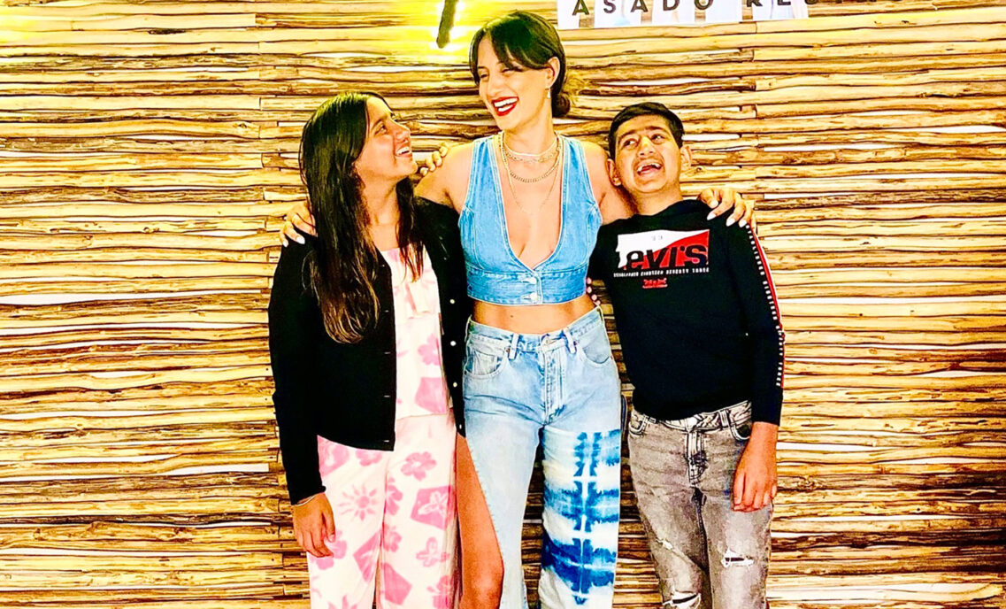 LS&Co. VP of Human Resources, Europe, Rajie Kaur, poses with her two children.