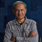 Levi Strauss & Co. Chief Financial and Growth Officer Harmit Singh poses in front of a blue textured background
